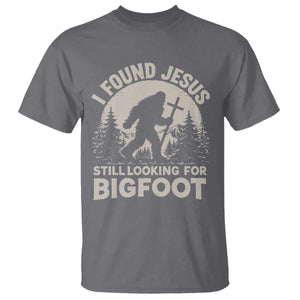 I Found Jesus Still Looking For Bigfoot T Shirt - Funny Christian Sasquatch Forest Humor Tee TS11 Charcoal Print Your Wear