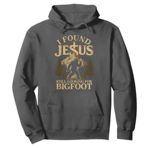 I Found Jesus Still Looking For Bigfoot Hoodie Funny Christian Sasquatch Vintage Mountain TS11 Dark Heather Print Your Wear