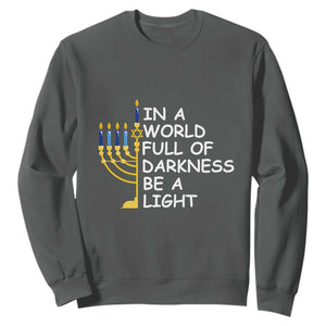 Funny Hanukkah Sweatshirt In A World Full Of Darkness Be A Light Menorah TS11 Dark Heather Print Your Wear
