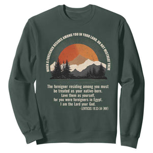 When A Foreigner Resides Among You In Your Land Do Not Mistreat Them Sweatshirt Leviticus Bible Verse TS11 Dark Forest Green Print Your Wear