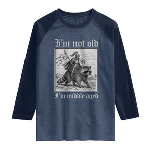 I Am Not Old I Am Middle Aged Raglan Shirt Medieval Knight Riding Raccoon Funny Ren Faire TS11 Heather Denim Navy Print Your Wear