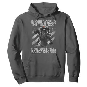 Combat Medic Hoodie In Our World The Title Doc Is Not Earned Form A Fancy Degree TS11 Dark Heather Print Your Wear