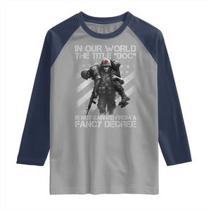 Combat Medic Raglan Shirt In Our World The Title Doc Is Not Earned Form A Fancy Degree TS11 Sport Gray Navy Print Your Wear