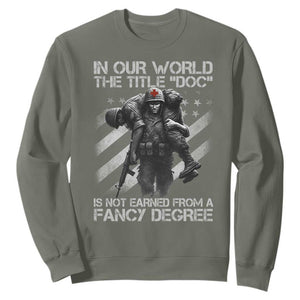 Combat Medic Sweatshirt In Our World The Title Doc Is Not Earned Form A Fancy Degree TS11 Military Green Print Your Wear