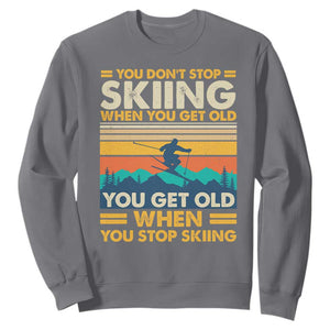Funny You Dont Stop Skiing When You Get Old You Get Old When You Stop Skiing Sweatshirt TS11 Charcoal Print Your Wear