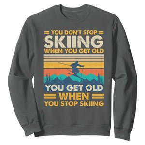 Funny You Dont Stop Skiing When You Get Old You Get Old When You Stop Skiing Sweatshirt TS11 Dark Heather Print Your Wear