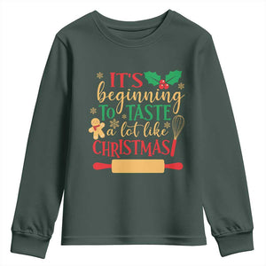 Funny Christmas Baker Youth Sweatshirt It's Beginning To Taste A Lot Like Christmas Gingerbread TS11 Dark Forest Green Print Your Wear