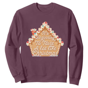Funny Christmas Cookie Baking Sweatshirt It's Beginning To Taste A Lot Like Christmas Gingerbread House TS11 Maroon Print Your Wear
