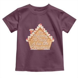 Funny Christmas Cookie Baking Toddler T Shirt It's Beginning To Taste A Lot Like Christmas Gingerbread House TS11 Maroon Print Your Wear