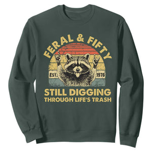 50th Birthday Raccoon Sweatshirt Feral And Fifty Still Digging Through Life's Trash Est 1976 TS11 Dark Forest Green Print Your Wear