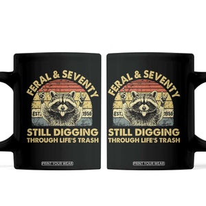 70th Birthday Raccoon Coffee Mug Feral And Seventy Still Digging Through Life's Trash Est 1956 TS11 Black Print Your Wear