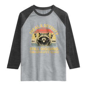 70th Birthday Raccoon Raglan Shirt Feral And Seventy Still Digging Through Life's Trash Est 1956 TS11 Heather Gray Heather Charcoal Print Your Wear