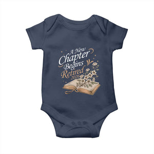 A New Chapter Begins Retired 2026 Baby Onesie Retired Teacher Floral Book TS11 Navy Print Your Wear