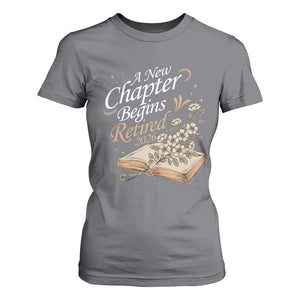 A New Chapter Begins Retired 2026 T Shirt For Women Retired Teacher Floral Book TS11 Charcoal Print Your Wear