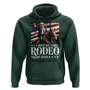 Funny Ain't My First Rodeo Trump 2024 Hoodie Western Cowboy American Flag TS11 Dark Forest Green Print Your Wear