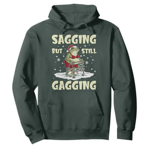 Funny Sagging But Still Gagging Christmas Frog Hoodie Funny Cringe Meme Gag Humor TS11 Dark Forest Green Print Your Wear