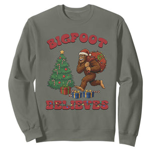 Funny Bigfoot Santa Believes Six Seven Meme Sweatshirt Trendy Gen Z Xmas Gift TS12 Military Green Print Your Wear