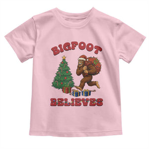 Funny Bigfoot Santa Believes Six Seven Meme Toddler T Shirt Trendy Gen Z Xmas Gift TS12 Light Pink Print Your Wear