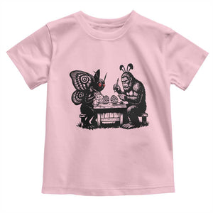 Funny Bigfoot And Mothman Egg Painting Toddler T Shirt Cryptid Easter Gift TS12 Light Pink Print Your Wear