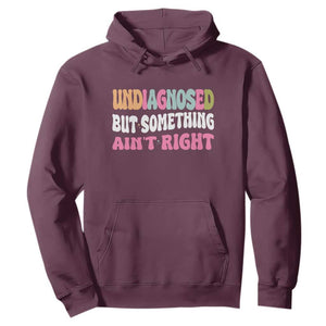 Funny Relatable Saying Hoodie Undiagnosed But Something Aint Right TS12 Maroon Print Your Wear