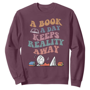 A Book A Day Keeps Reality Away Sweatshirt Cute Girl Book Lover TS12 Maroon Print Your Wear