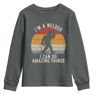 Funny Bigfoot Welding Gift Youth Sweatshirt I Can Do Amazing Things With A Welder TS12 Dark Heather Print Your Wear