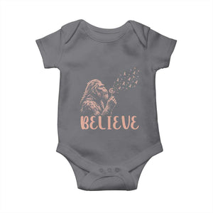 Funny Bigfoot Blowing Dandelion Flower Graphic Baby Onesie Believe Endometrial Cancer Awareness