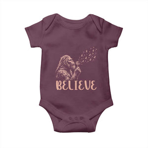 Funny Bigfoot Blowing Dandelion Flower Graphic Baby Onesie Believe Endometrial Cancer Awareness