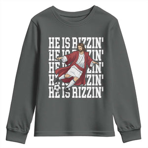 He Is Rizzin Youth Sweatshirt Funny Christian Soccer Lover Gift TS12 Dark Heather Print Your Wear