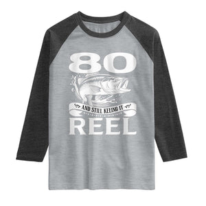 Still Keeping It Reel At 80 Raglan Shirt Fisherman Birthday Gift TS12 Heather Gray Heather Charcoal Print Your Wear