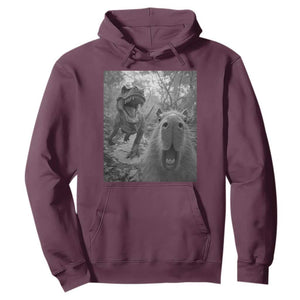 Funny Capybara Selfie With Dinosaur Meme Hoodie Animal Humor Gift TS12 Maroon Print Your Wear