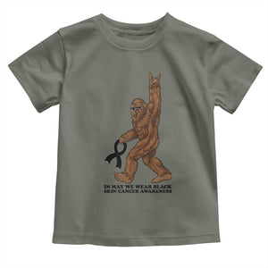 Funny Bigfoot Skin Cancer Support Toddler T Shirt In May We Wear Black TS12 Military Green Print Your Wear