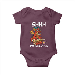 Shhh I Am Reading Baby Onesie Funny Dragon Reading Book TS12 Maroon Print Your Wear
