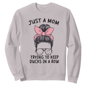 Just A Mom Trying To Keep Her Ducks In A Row Sweatshirt Funny Duck Mom Messy Hair Bun Moms Life TS14 Ice Gray Print Your Wear
