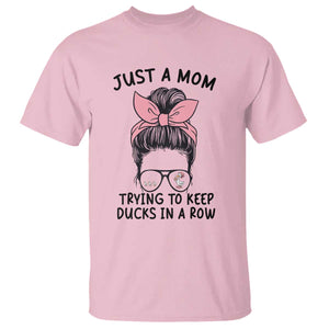 Just A Mom Trying To Keep Her Ducks In A Row T Shirt Funny Duck Mom Messy Hair Bun Moms Life TS14 Light Pink Print Your Wear