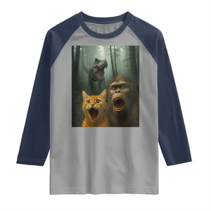 Cat Bigfoot Selfie With Dinosaur Raglan Shirt Funny Surprised Scared Sasquatch Cat TS14 Sport Gray Navy Print Your Wear