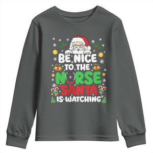 Christmas Nurse Youth Sweatshirt Be Nice To The Nurse Santa Is Watching TS14 Dark Heather Print Your Wear