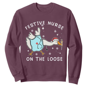 Funny ER Nurse Goose Christmas Sweatshirt Festive Nurses On The Loose TS14 Maroon Print Your Wear