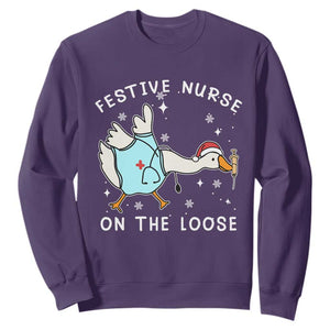 Funny ER Nurse Goose Christmas Sweatshirt Festive Nurses On The Loose TS14 Purple Print Your Wear