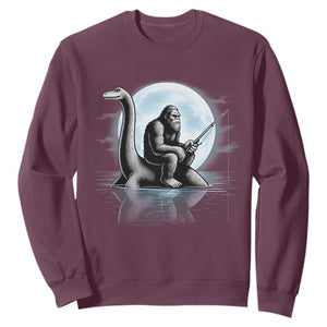 Funny Bigfoot Fishing Sweatshirt Sasquatch Riding Nessie Cryptid Moon Night TS14 Maroon Print Your Wear