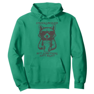 Undiagnosed But Something Aint Right Hoodie Funny Racoon Saying TS14 Irish Green Print Your Wear