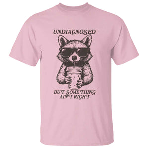 Undiagnosed But Something Aint Right T Shirt Funny Racoon Saying TS14 Light Pink Print Your Wear
