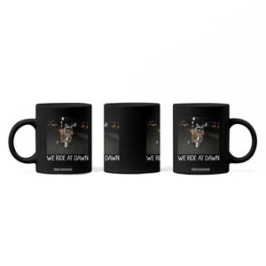 We Ride at Dawn Coffee Mug Funny Racoon Riding Tricycle Chaotic Meme