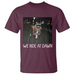 We Ride at Dawn T Shirt Funny Racoon Riding Tricycle Chaotic Meme