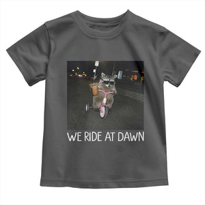 We Ride at Dawn Toddler T Shirt Funny Racoon Riding Tricycle Chaotic Meme