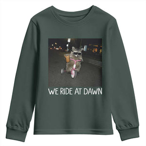 We Ride at Dawn Youth Sweatshirt Funny Racoon Riding Tricycle Chaotic Meme