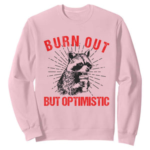 Burnt Out But Optimistic Sweatshirt Funny Raccoon Meme TS14 Light Pink Print Your Wear