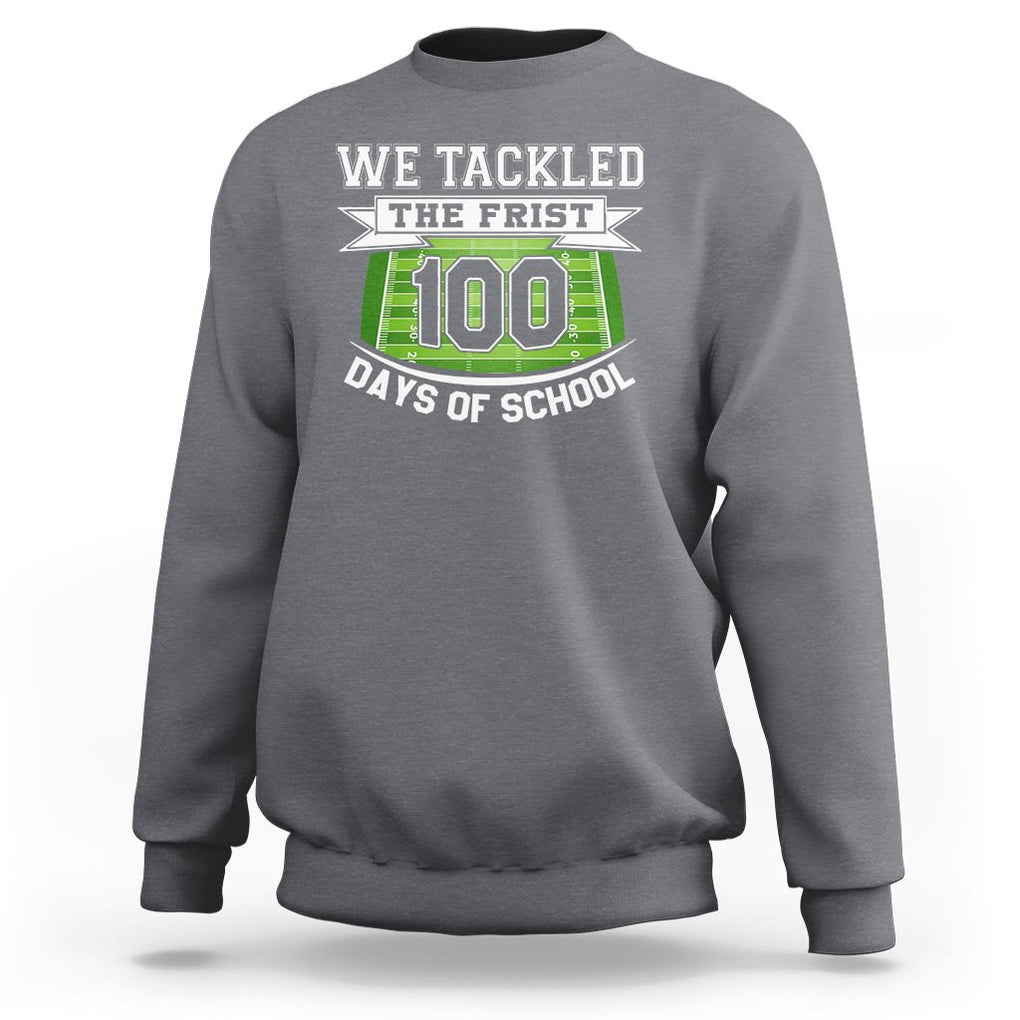 100th Day Of School Sweatshirt Football We Tackled The Firrst 100 Days Of School TS09 Charcoal Printyourwear