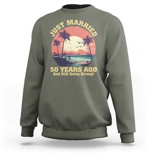 50th Wedding Anniversary Sweatshirt Just Married 50 Years Ago And Still Going Strong TS09 Military Green Printyourwear