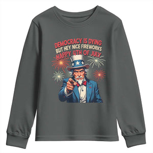 Funny 4th of July Democracy Is Dying Youth Sweatshirt But Hey Nice Fireworks Satirical Uncle Sam TS02 Dark Heather Print Your Wear